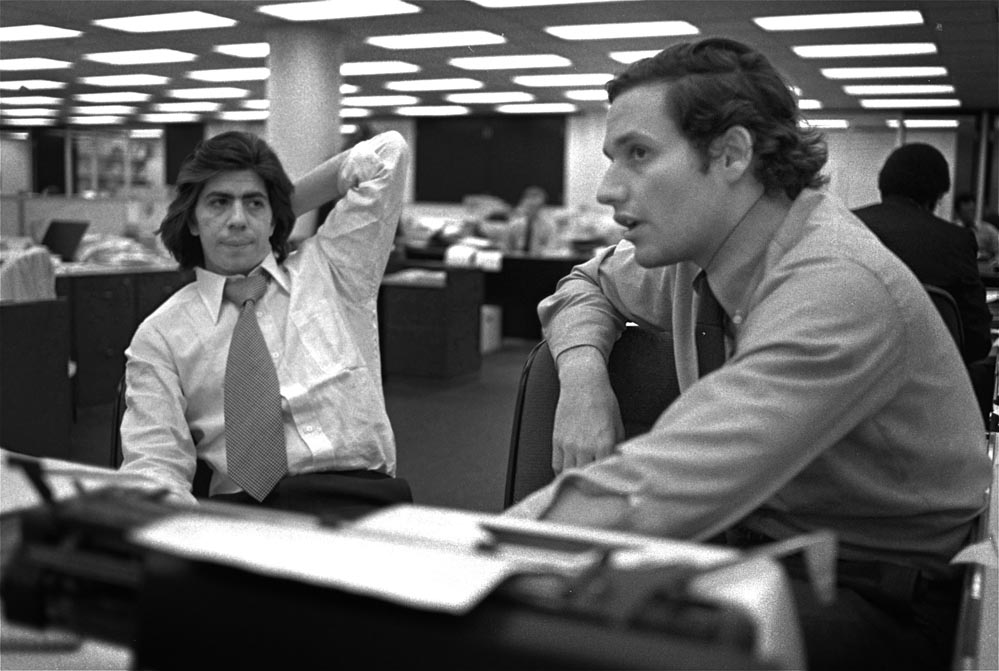 **FILE** Reporters Bob Woodward, right, and Carl Bernstein, whose reporting of
the Watergate case won a Pulitzer Prize, sit in the newsroom of the Washington
Post, May 7, 1973. W. Mark Felt, a former FBI official claims he was "Deep
Throat," the long-anonymous source who leaked secrets about President Nixon's
Watergate coverup to The Washington Post, Vanity Fair reported Tuesday May 31,...
