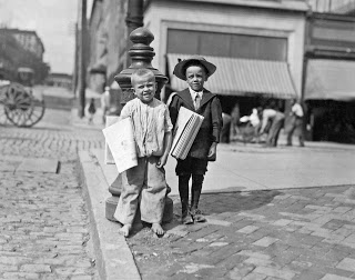 lewis-hine-richard-green-with-hat-5-year-old-newsie_-many-of-these-little-newsboys-here_-richmond-virginia-1911.jpg